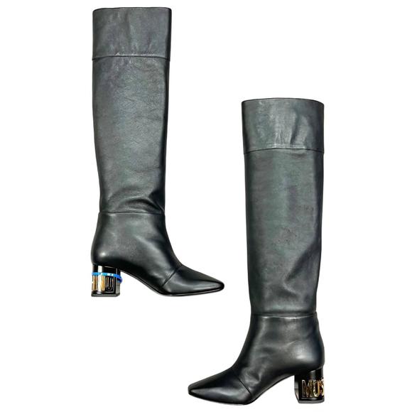 MOSCHINO pre-loved gold letter heel riding boots in black & gold - Picture 2 of 4